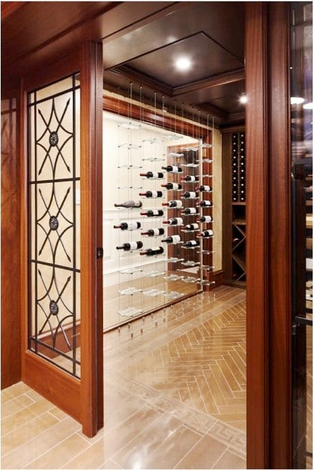 Gorgeous Wrought Iron Door in a Contemporary Wine Cellar