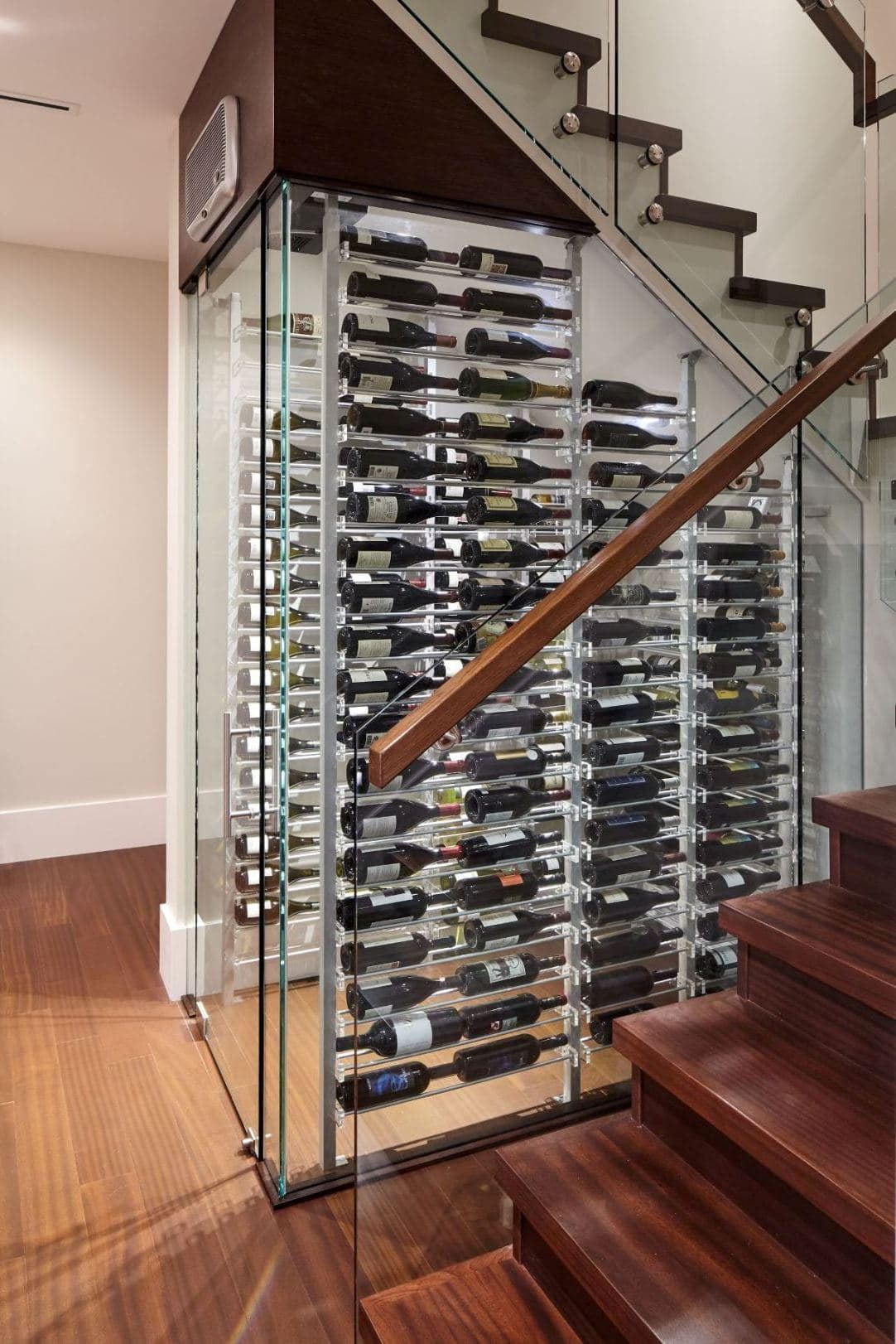 Glass Wine Cellar with Modern Millesime Wine Racks Designed by Las Vegas Experts