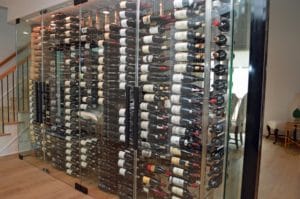 Residential wine cellar with four movable glass panels