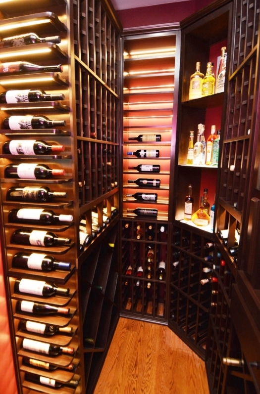 Knotty Alder Wooden Wine Racks Add Elegance to this Home Wine Cellar