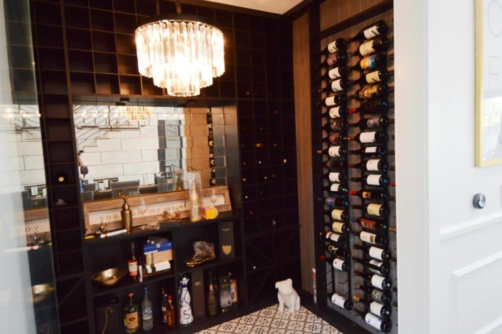Glass Wine Cellar Design with Wooden and Metal Wine Racks