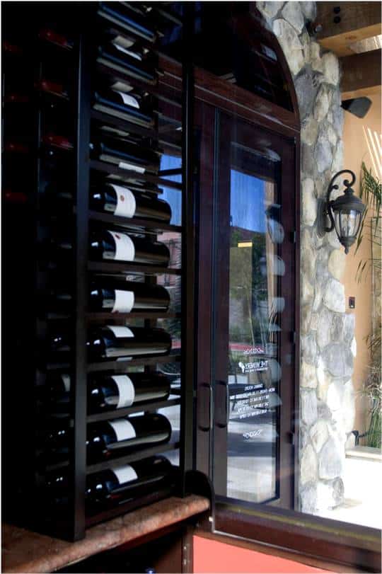 wooden-wine-cellar-door-with-glass-panel