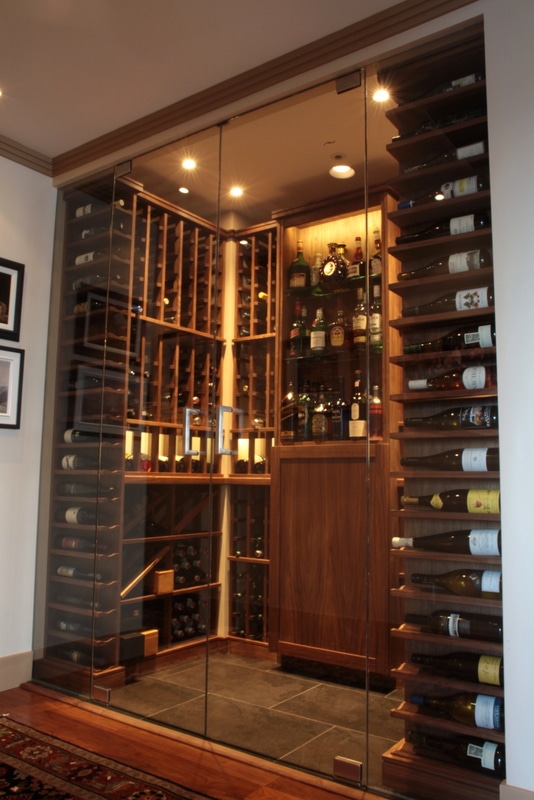Residential Glass Wine Cellar Designed with Traditional Features